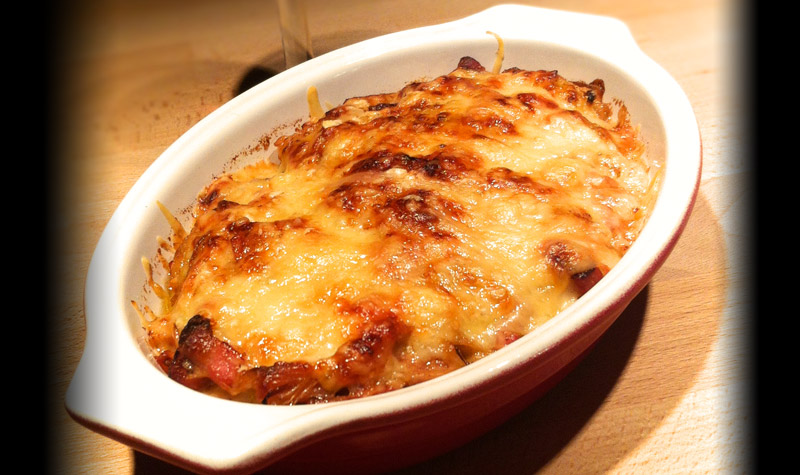 Gratin de poireaux aux lardons - Ce gratin de poireaux est un bon moyen de faire aimer les légumes aux enfants.