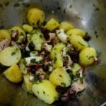 Salade de poulpe de roche - Mélanger puis goûter, rectifier l’assaisonnement si nécessaire.